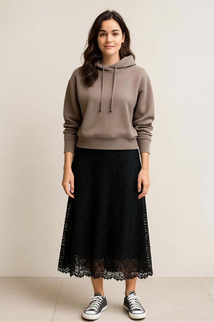 Black Lace Skirt with Casual Sneakers and a Hoodie