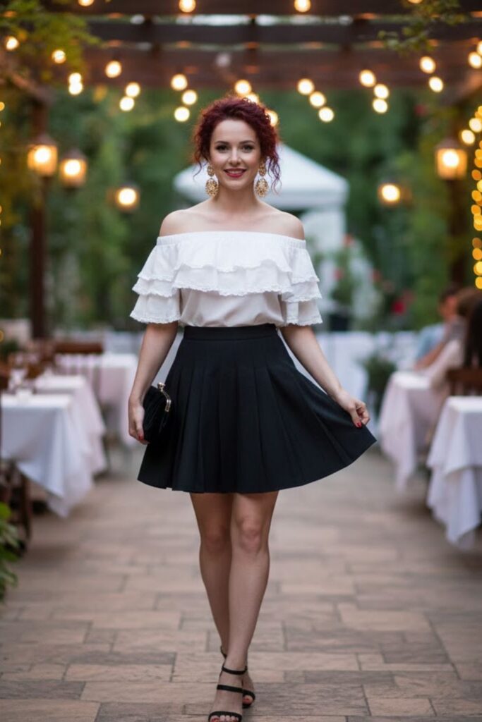 15. Black Pleated Mini Skirt with Ruffled Blouse